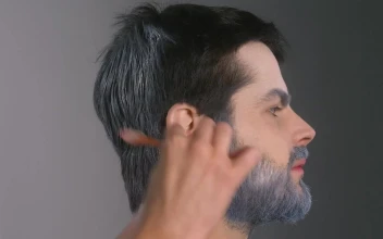 Stock Video Painting A Mans Hair White Winter Style