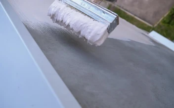 Stock Video Painting A Wall With White Paint