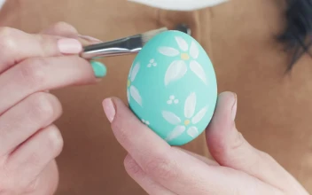 Stock Video Painting Easter Eggs With Flowers