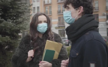 Stock Video Pair Of Boys With Masks Talking On The Street