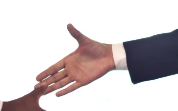 Stock Video Pair Of Hands Shaking Hands On White Background
