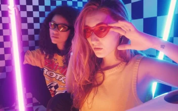 Stock Video Pair Of Stylish Girls Posing Captivatingly