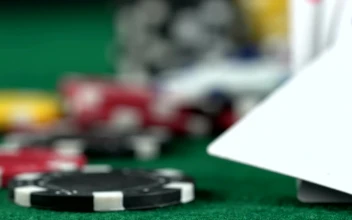 Stock Video Panning Shot Of A Casino Board With Dice And Poker
