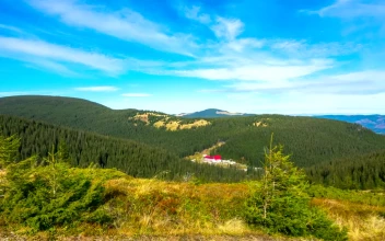 Stock Video Panorama From The Top Of A Sunny Mountain Range