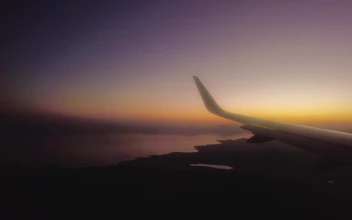 Stock Video Panorama From The Window Of An Airplane At Dusk