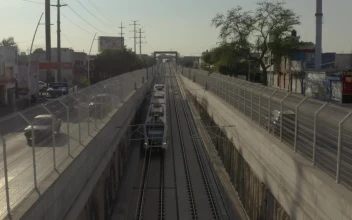 Stock Video Passenger Train Traveling Between The Streets Of A City