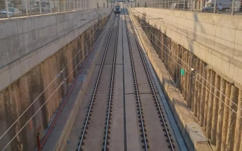 Stock Video Passenger Train Traveling On The Tracks Crossing The City