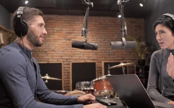 Stock Video People Recording A Podcast In A Studio