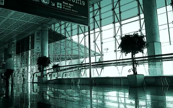 Stock Video People Walking Down An Airport Corridor In Fast Motion