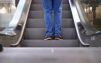 Stock Video People Walking Into The Escalator