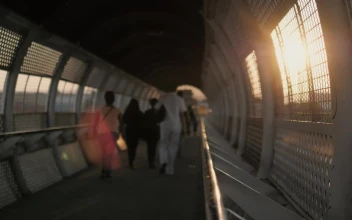 Stock Video People Walking On A Footbridge