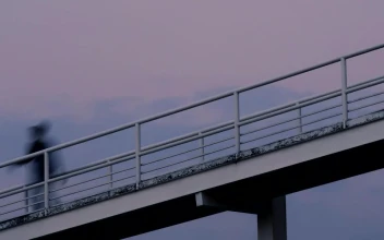Stock Video People Walking On A Footbridge Timelapse