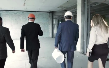 Stock Video People Walking Through The Construction Site