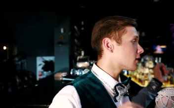 Stock Video People Wearing Retro Party Costumes In A Bar