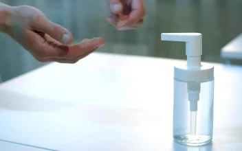 Stock Video Person Applying Alcohol Gel On Their Hands