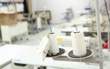 Stock Video Person Changing The Thread Of A Sewing Machine