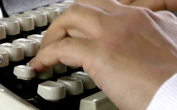 Stock Video Person Hands Typing On Typewriter
