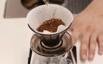Stock Video Person Making A V Pour Over Coffee From Above