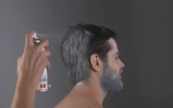 Stock Video Person Painting The Hair Of A Winter Model