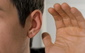 Stock Video Person Places His Hand On His Ear To Hear Better