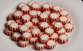 Video Stock Red Spermints On A White Plate Rotating Free