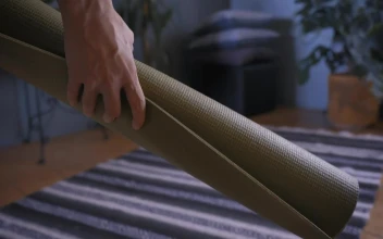 Video Stock Person Putting A Yoga Mat On The Floor Free