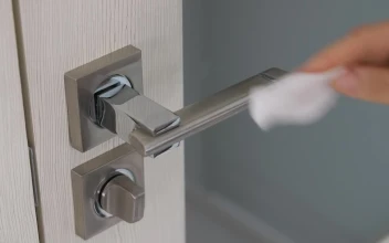 Video Stock Person Sanitizing A Doorknob Free