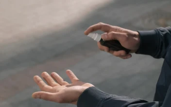 Video Stock Person Sanitizing His Hands With A Spray Free