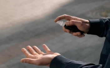 Video Stock Person Sanitizing Their Hands Free