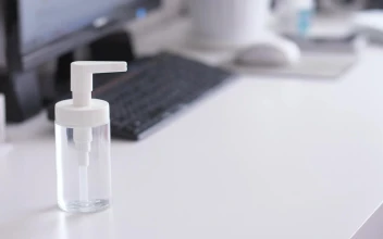 Video Stock Person Sanitizing Their Hands In The Office Free
