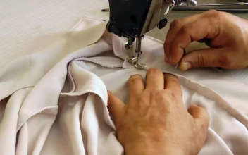 Video Stock Person Sewing A Shirt On Machine Free