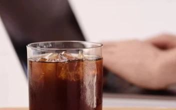 Video Stock Person Typing On A Laptop Next To A Coffee Free