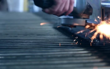 Video Stock Person Using An Industrial Grinder Free