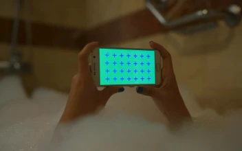 Video Stock Person With His Cell Phone In A Foam Bath Free