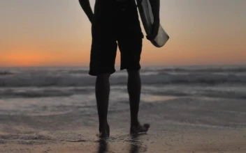 Video Stock Person With Surfboard Walks Towards Waves Free