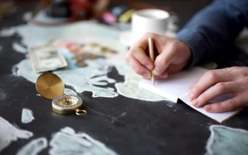 Video Stock Person Writing His Travel Itinerary Free