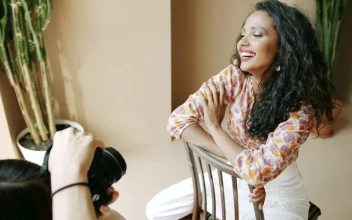 Video Stock Photographer Portraying A Smiling Model Free