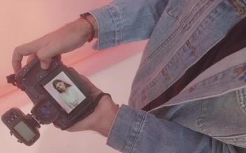 Video Stock Photographer Reviewing A Photoshoot On His Camera Free