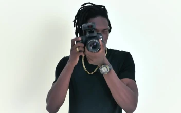 Video Stock Photographer Taking Photos Head On On A White Background Free