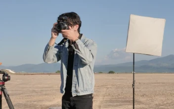 Video Stock Photographer Taking Photos In A Desert Free