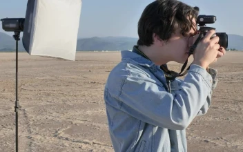 Video Stock Photographer Taking Photos In The Middle Of A Desert Free