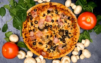Video Stock Placing Raw Mushrooms On A Cooked Pizza Free