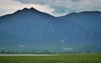 Video Stock Plain With A Lake Surrounded By Large Sunny Mountains Free