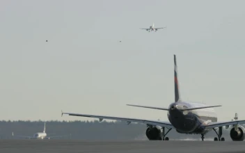 Video Stock Plane Landing While Another Moves To Take Off Free
