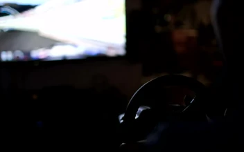 Video Stock Playing A Racing Game With A Wheel Free