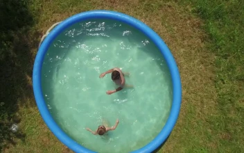 Video Stock Playing In An Inflatable Pool Free