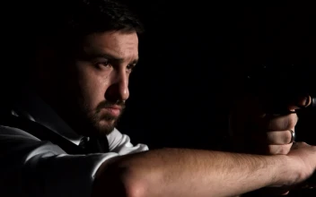 Video Stock Police Officer With A Flashlight In A Dark Room Free