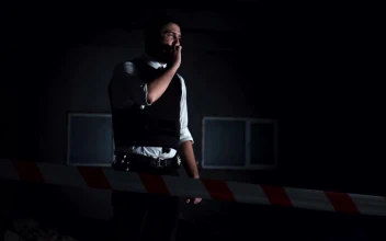 Video Stock Police Officer With A Flashlight Smoking Free