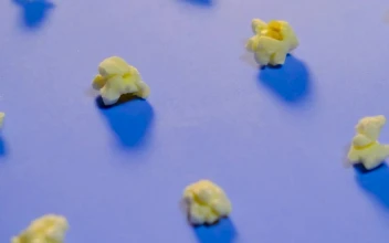 Video Stock Popcorn On A Blue Surface Changing Size In Stop Motion Free