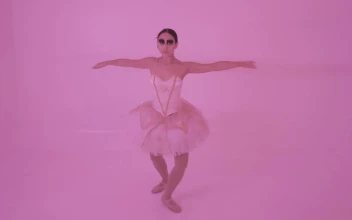 Video Stock Portrait Of A Ballerina Spinning With Pink Background Free
